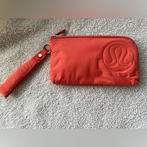 Lululemon orange nylon wristlet